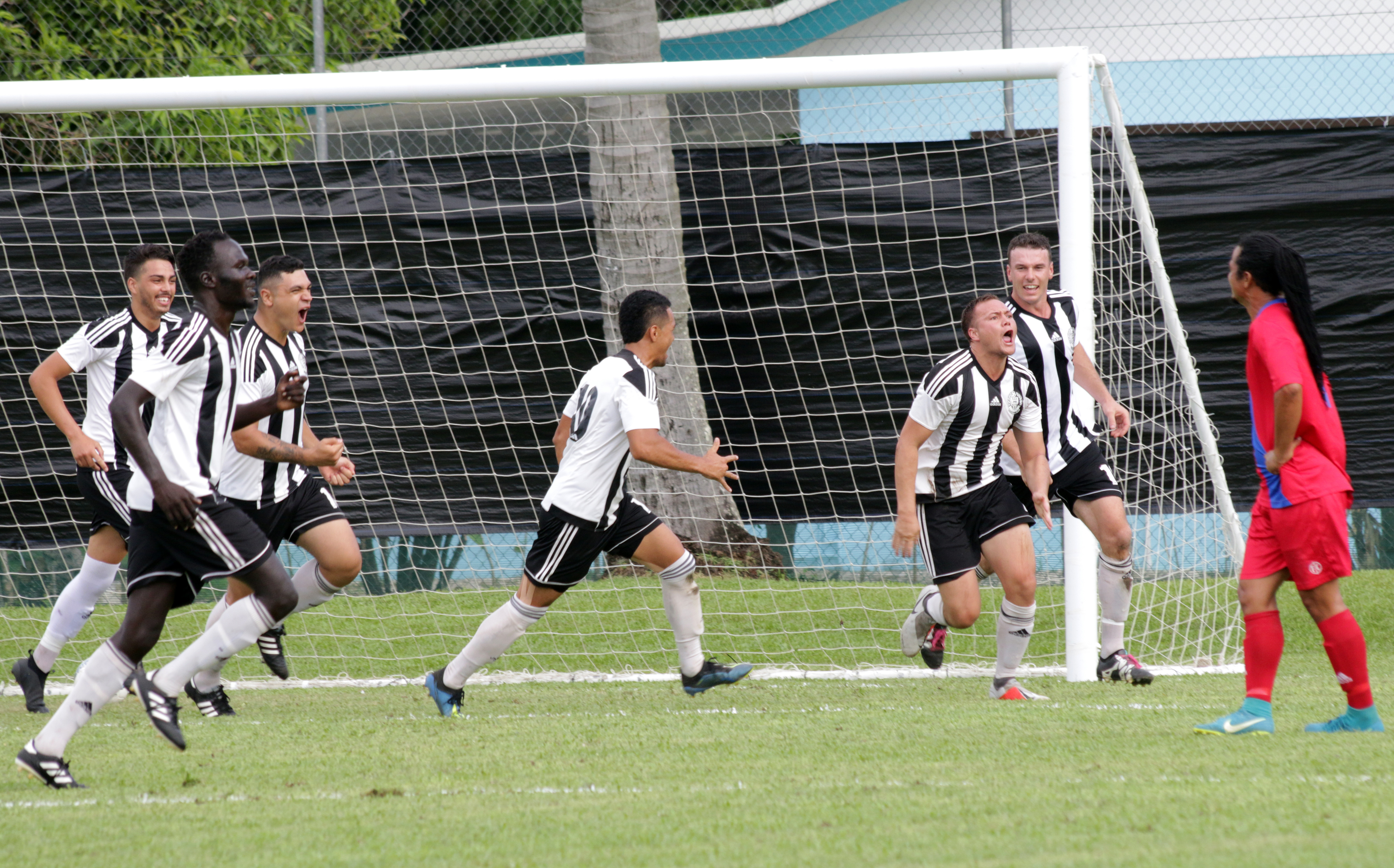 Tupapa Maraerenga FC celebrating Harlem Simiona's Opening goal in the 3rd minute of the game